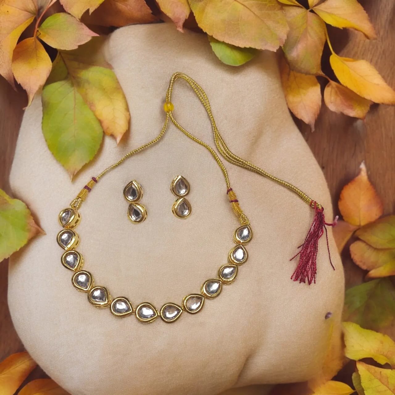 "Delicate Kundan Necklace - Double-sided, classy and versatile jewelry piece for modern women."